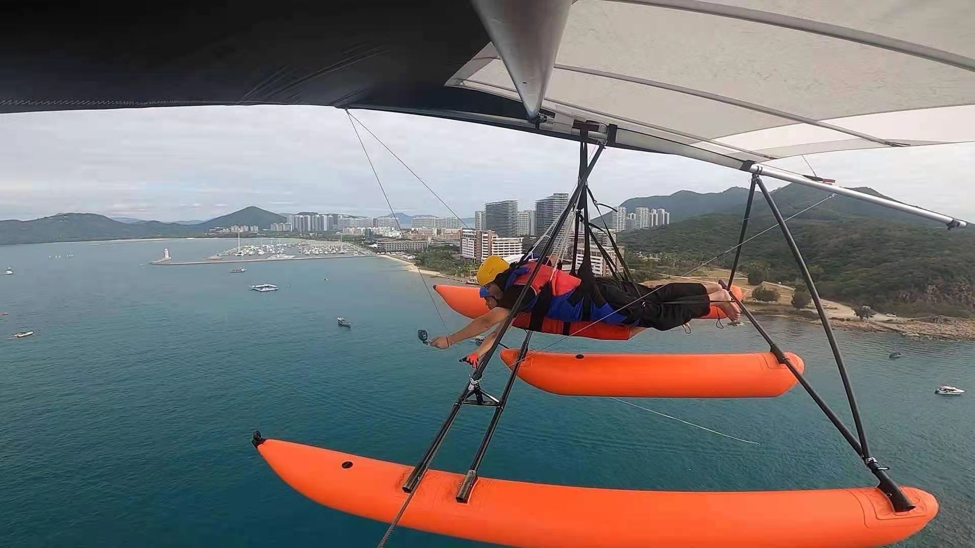 海南三亞滑翔翼三角翼飛行體驗三亞灣鳳凰島低空觀光空中看三亞半山